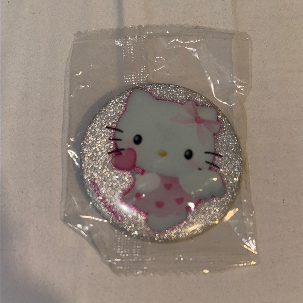 Hello Kitty Pink and Silver angel pin badge